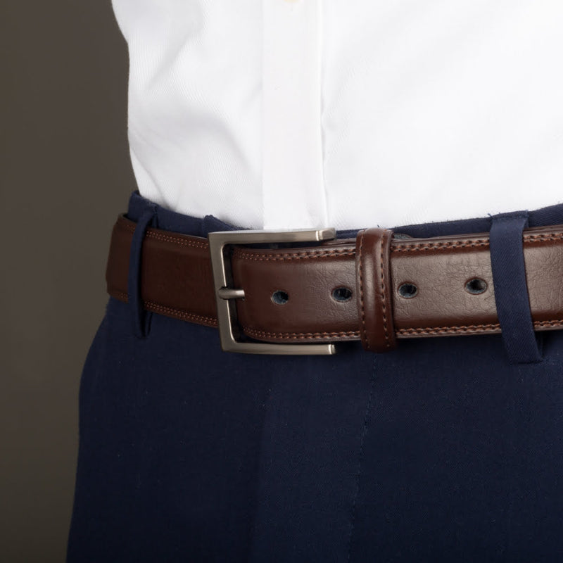 Derby strap - brown leather belt with stitching and brushed grey buckle on model